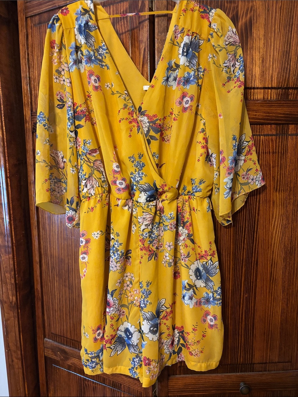 Mustard Floral Wrap Romper with Knot Detail